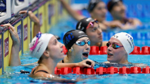 Gretchen Walsh sets 100m butterfly world record at US Olympic swimming trials
