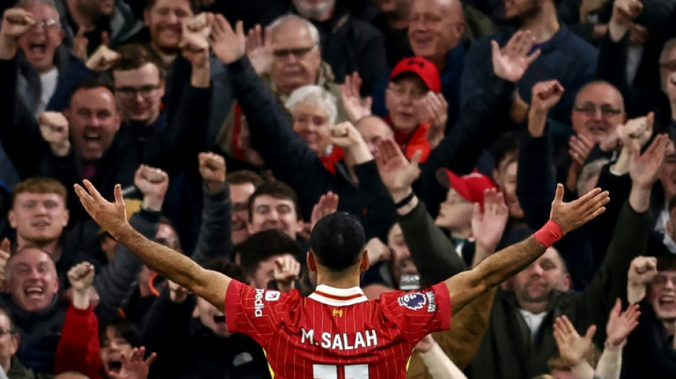 Salah strike beats Brighton to take Liverpool top