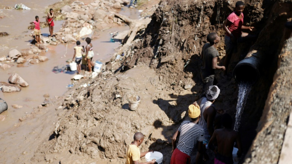 Damaged roads and bridges hamper aid for S. Africa flood victims

