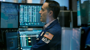 Wall Street finit en petite baisse, la Fed se montre plus agressive