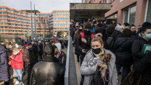 Despair, hope as Ukrainian refugees arrive in Prague