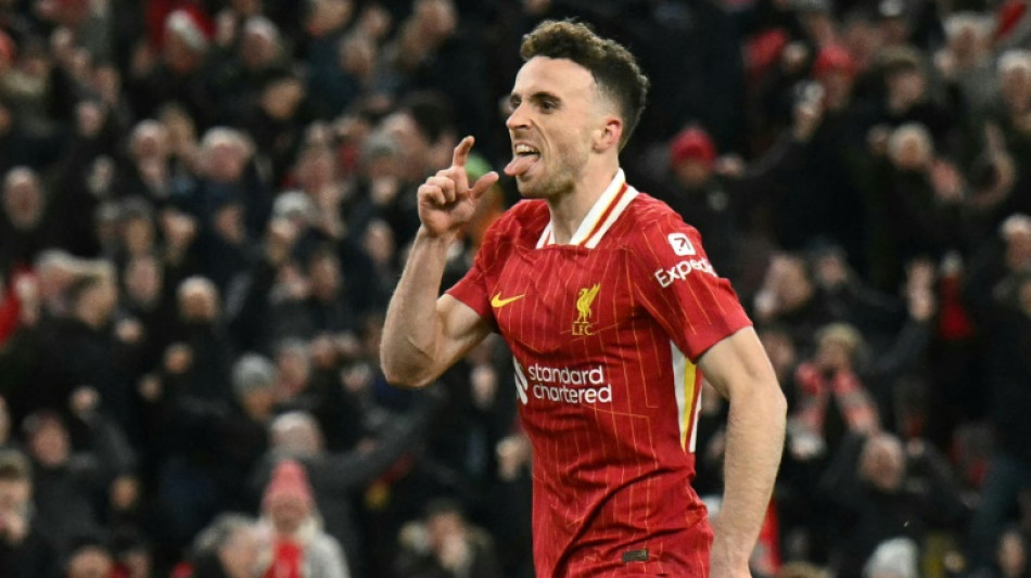 Jota salvages point for 10-man Liverpool against Fulham