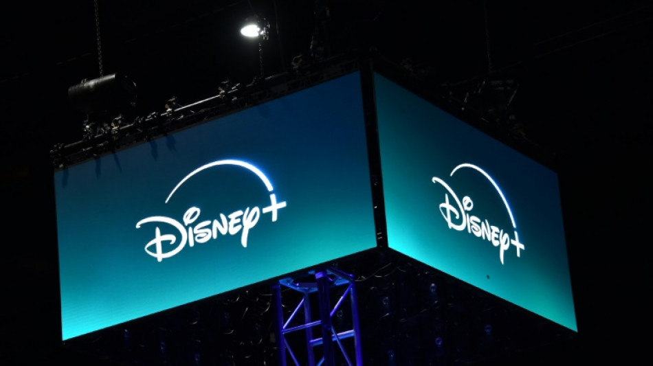 Disney reports streaming profit but parks under strain