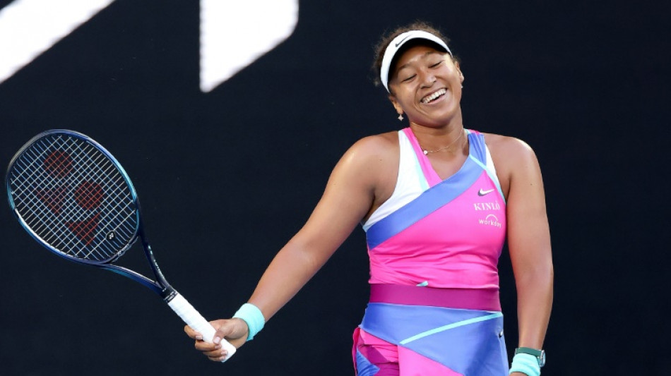 Osaka all smiles as champion moves closer to Barty showdown
