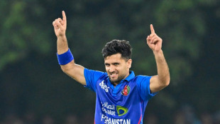 Afghanistan beat PNG to advance at T20 World Cup as NZ eliminated