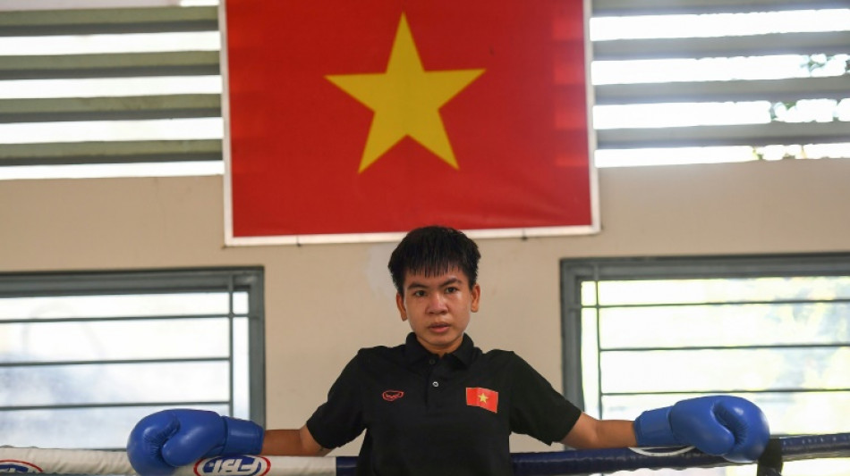 Boxer battles poverty, misogyny to be Vietnam's first world champion