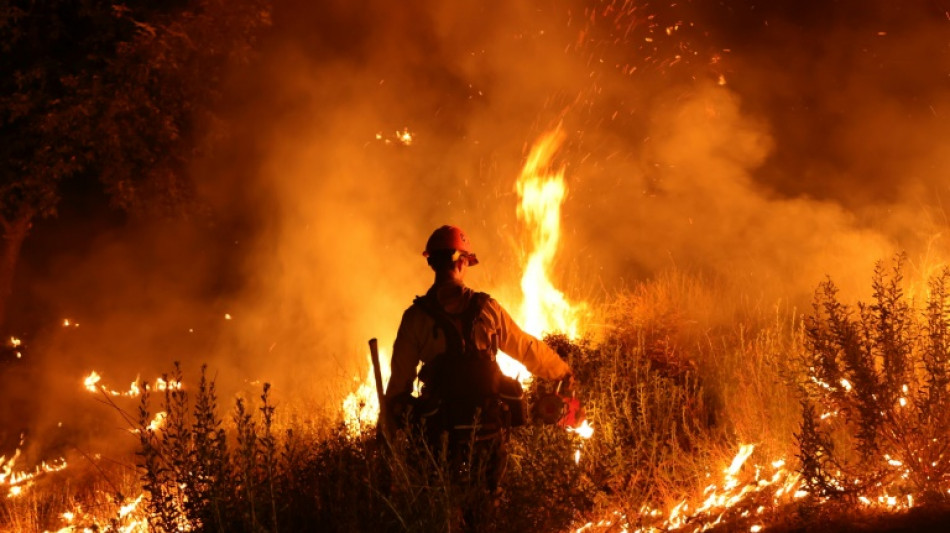 Dangerous heatwaves strike globe as wildfires rage