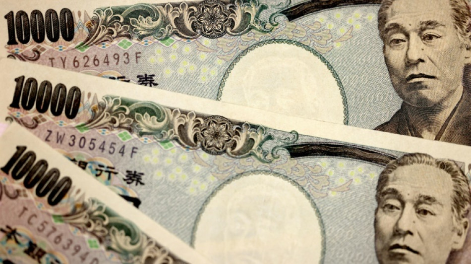 Yen drops to 20-year low against dollar