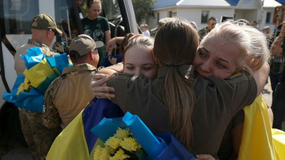 'Tell everyone I'm home': Ukrainian prisoners rejoice at rare swap