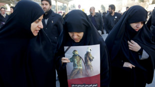 Iran firefighters protest living conditions on deadly blaze anniversary