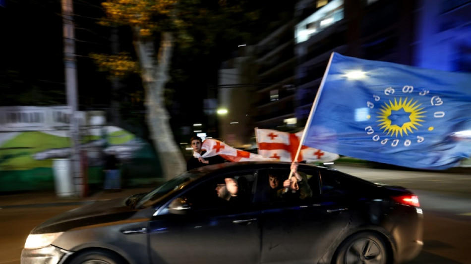 Georgia opposition calls election results protests as president accuses Russia