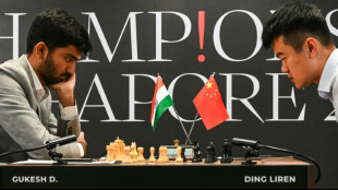 China's Ding beats 'nervous' Gukesh in world chess opener 