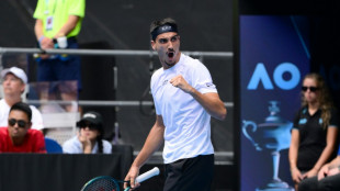 Sonego ends teenage qualifier Tien's Australian Open fairytale