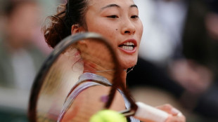 Zheng overpowers Osaka on grass with salvo of aces  