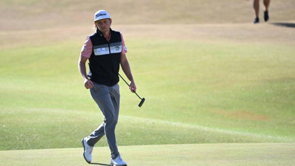 Aussie Smith surges into British Open lead as emotional Woods bows out