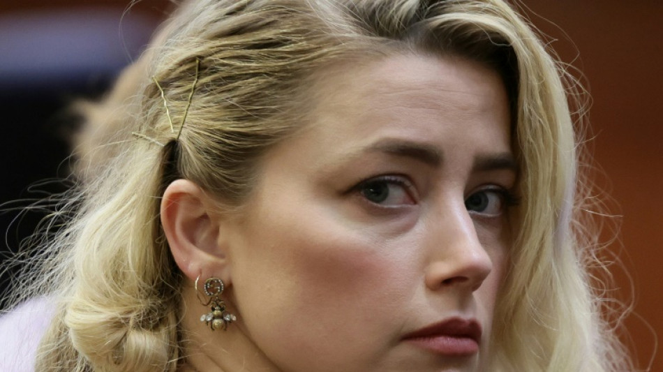 Amber Heard agrees to pay Johnny Depp $1m in defamation case