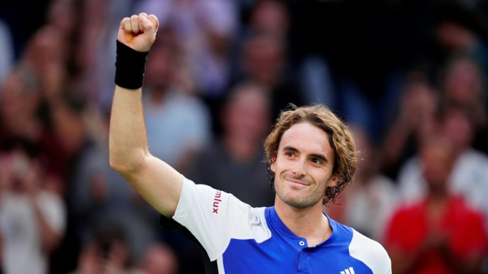 Tsitsipas keeps ATP Finals hopes alive with gritty Paris win 