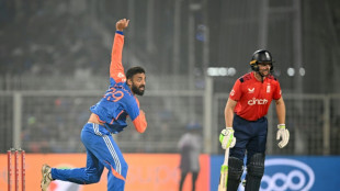 Sharma, bowlers help India thrash England in T20 opener