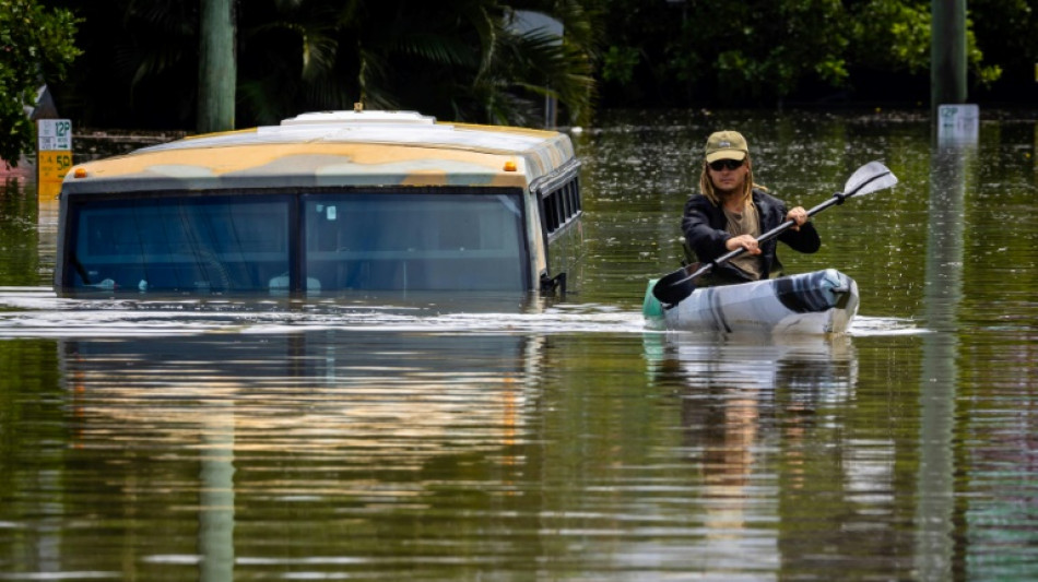 Australia tells tens of thousands to flee floods