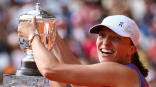 Swiatek seals place among greats with 'surreal' fourth French Open
