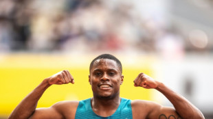 World champ Coleman wins first 100m after ban