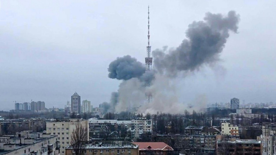 Ukraine accuses Russia of air strikes on housing block, TV tower