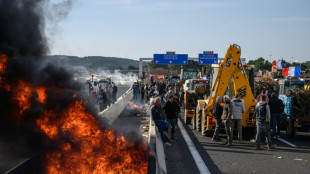 French farmers win concessions after moving to besiege Paris