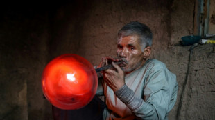 Fragile but unbroken, Afghan glassblowers refuse to quit