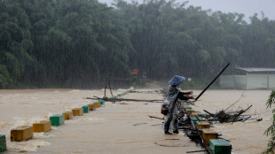 Over a dozen people missing as extreme weather hits China