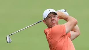 McIlroy fires bogey-free 65 to share US Open lead with Cantlay