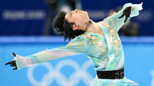 Injured skating star Hanyu to miss world championships