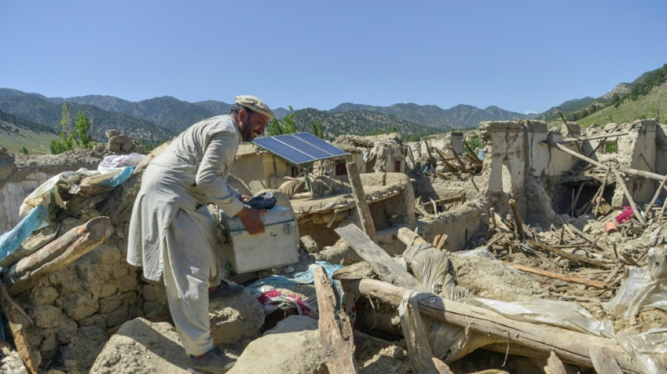 Quake-hit Afghan village struggles back to life as aid trickles in