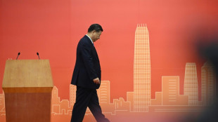 China's Xi presides over muted Hong Kong handover anniversary